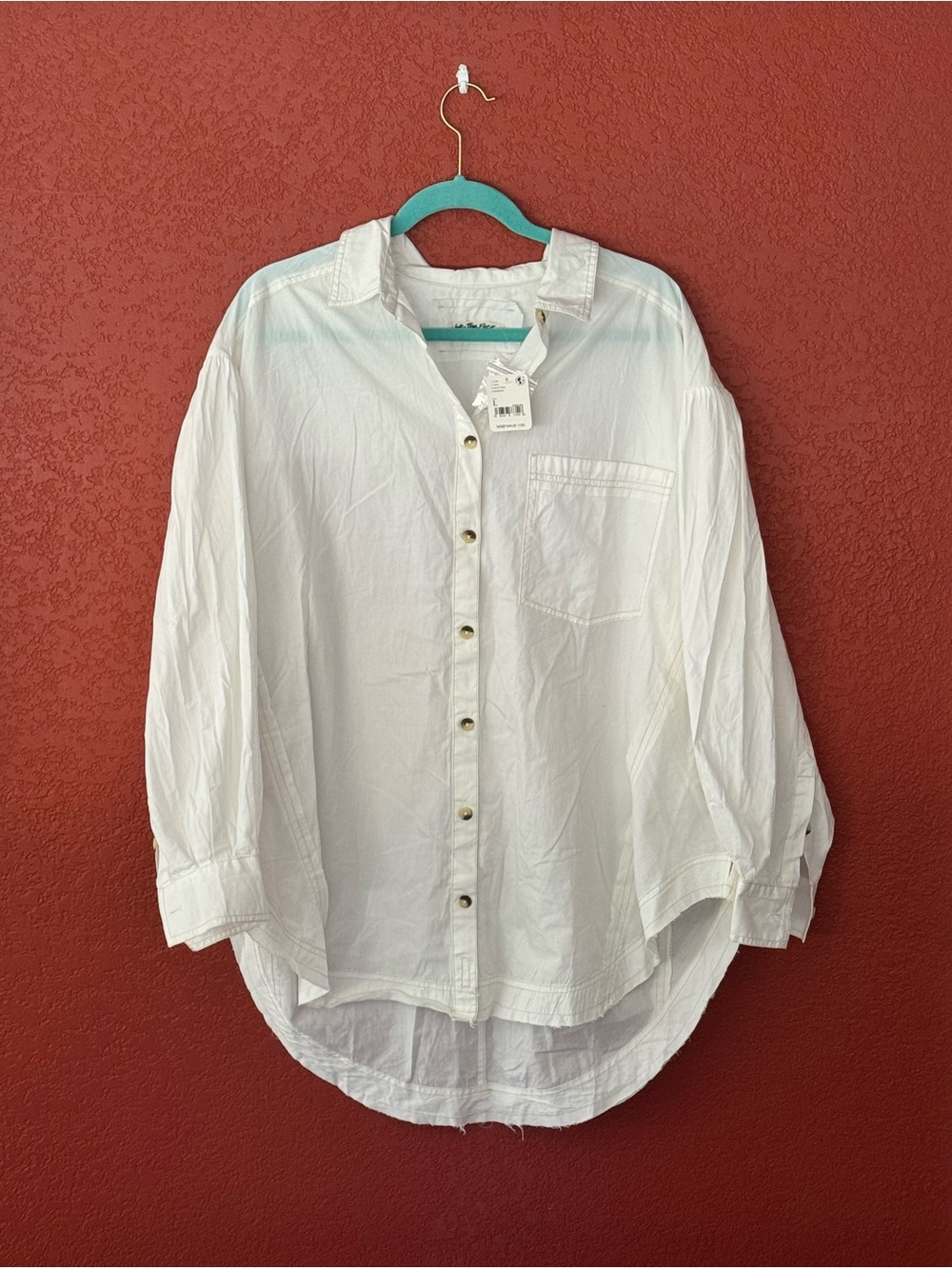 NWT We The Free oversized cream colored long sleeve shirt size large.
